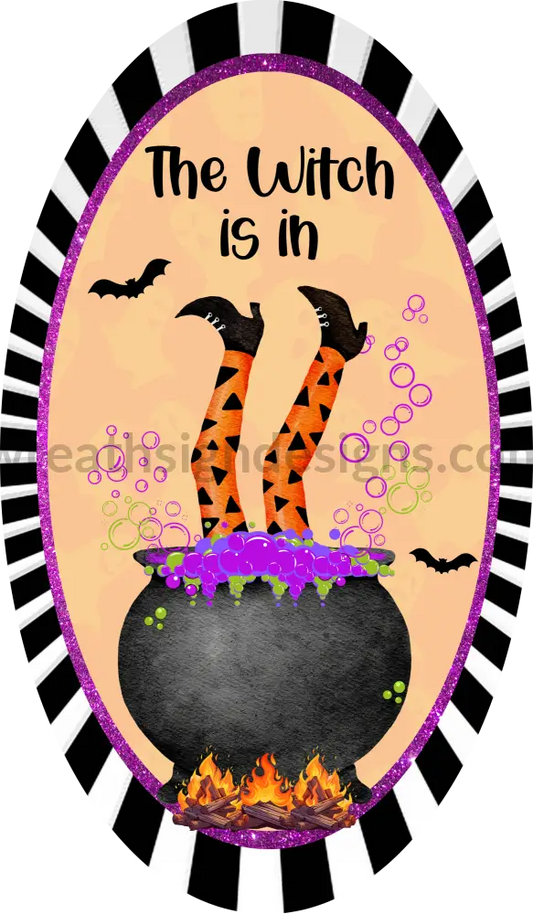 The Witch Is In Witches Cauldren 7X12 Oval Metal Wreath Sign